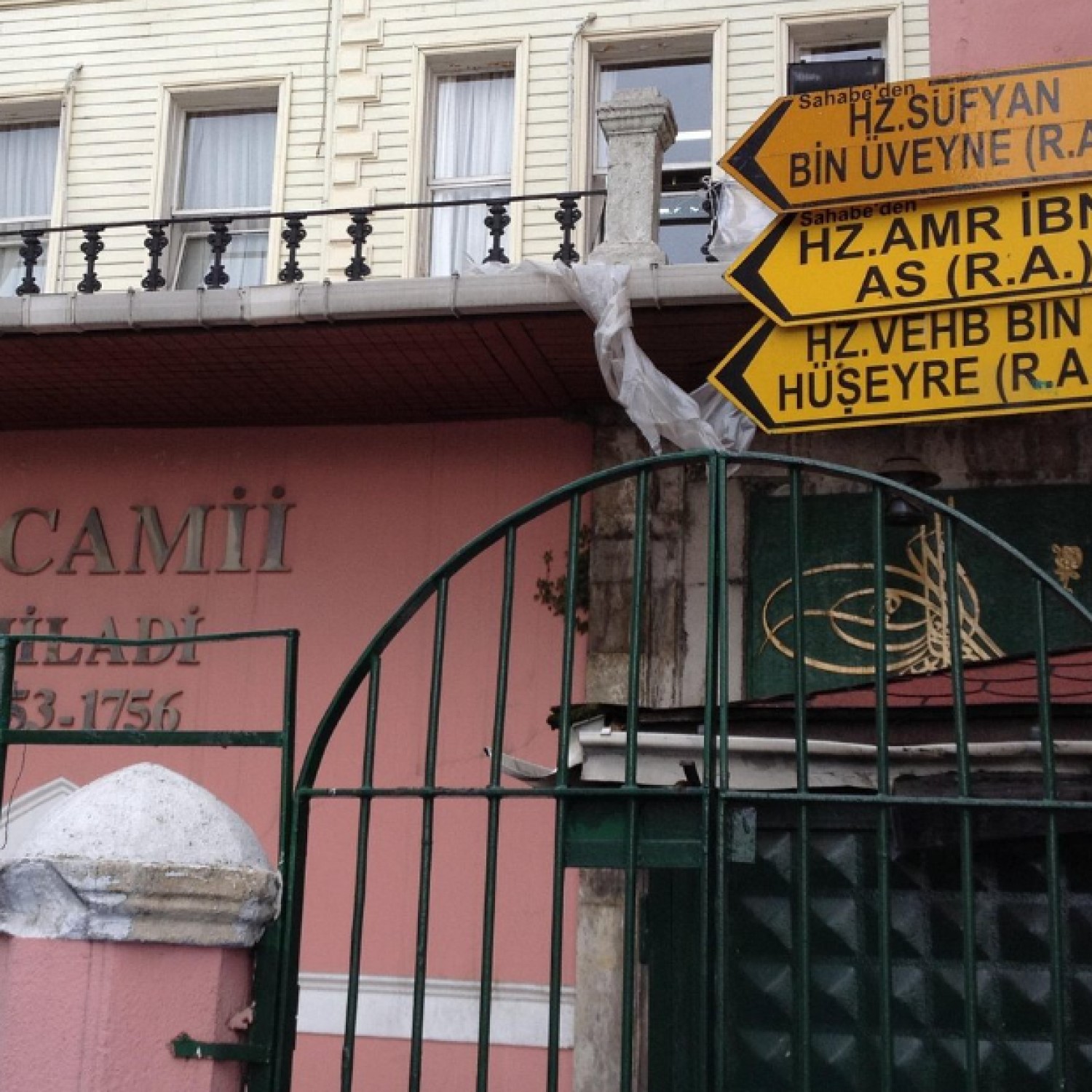 Entrance to a tomb with a sign showing who is interned there